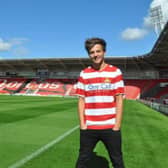 Doncaster Rovers fan Louis Tomlinson will be signing copies of his new album at the club’s ground later this month