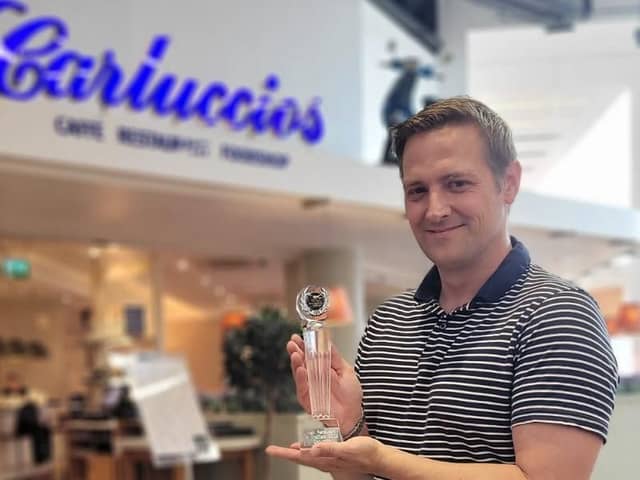 Ivor Dolinsek, Carluccio's Meadowhall general manager, with the restaurant's British Restaurant Awards trophy for 'Best Restaurant in Sheffield'. (Photo courtesy of Carluccio's)