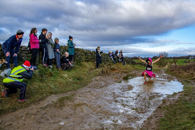 Runners taking part in the Boxing Day Chevin Chase run, photographed for The Yorkshire Post by Tony Johnson.
The event starts and finishes in Guiseley via a scenic 7 mile circuit of Otley Chevin which attracts around 1400 participants has been going for four decades