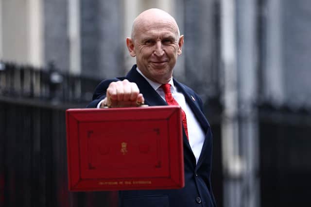 On Wednesday October 28, John Healey presented his first budget announcing £100 energy payment scheme |Photo by Henry NICHOLLS / AFP via Getty Images)