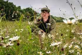 Jim Horsfall, South Yorks reserve team leader for Yorkshire Wildlife Trust, at the Fenn Carr Nature Reserve,  as the wildflower meadows bloom, seeded a decade ago to mark 60 years since the Queen's Coronation. Picture by Yorkshire Post Photographer Bruce Rollinson