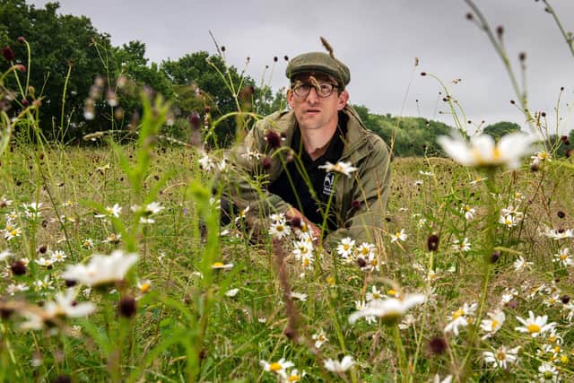 Jim Horsfall, South Yorks reserve team leader for Yorkshire Wildlife Trust, at the Fenn Carr Nature Reserve,  as the wildflower meadows bloom, seeded a decade ago to mark 60 years since the Queen's Coronation. 
Picture by Yorkshire Post Photographer Bruce Rollinson