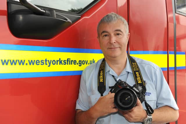 Photographer Ken Wilkinson who has just retired after 26 years as West Yorkshire Fire and Rescue photographer