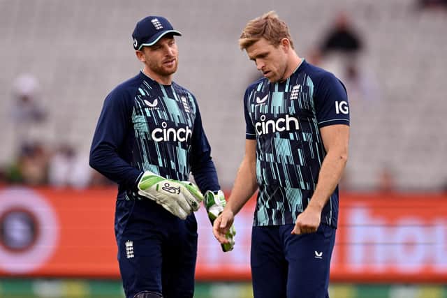 Leadership qualities. David Willey, right, might be a better option as captain than Jos Buttler, left. Photo by William West/AFP via Getty Images.