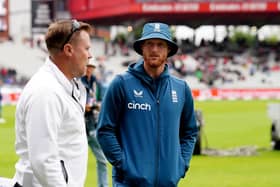 DONE DEAL: England's Ben Stokes speaks to an umpire as rain delays the start of play on day five at Old Trafford, the game ultimately ending in a draw. Picture: Mike Egerton/PA
