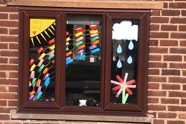 This lovely spring scene, featuring a rainbow and a flower has been created on Jermyn Avenue, Hackenthorpe by Hollie-Rose and Darcie who are aged seven and three.