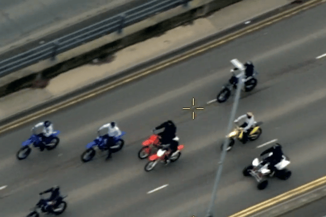 Watch: Dramatic moment suspect is knocked off motorbike after police ...