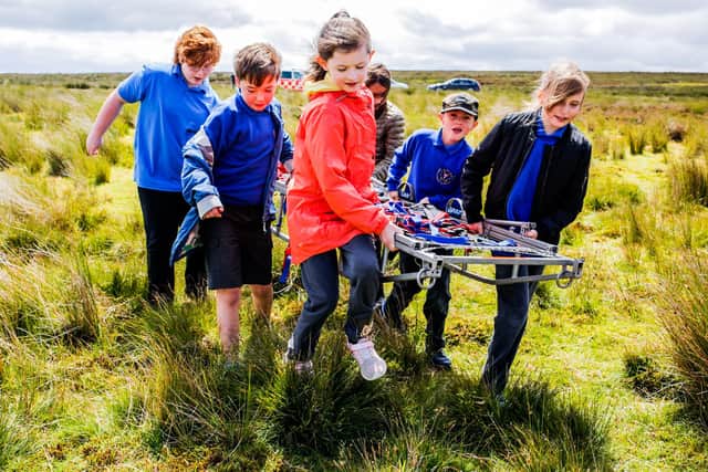 Fun and learning outdoors on the moors.  Photograph: Stuart Boulton