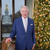 King Charles III during the recording of his Christmas message at Buckingham Palace. Photo credit: Jonathan Brady/PA Wire