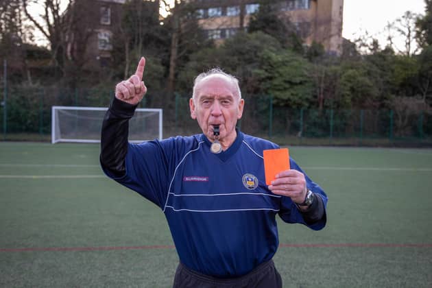 Frank Foster, 89, refereeing under 7's during their football game at Goodwin Sports Centre in Sheffield.