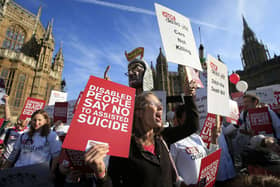 Protesters outside the Houses of Parliament as MPs voted on the Assisted Dying Bill in 2015.