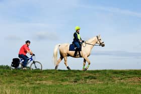 The Department for Environment, Food and Rural Affairs and Natural England have committed to consulting with Cycling UK and The British Horse Society after legal threats over access to a new National Trail.