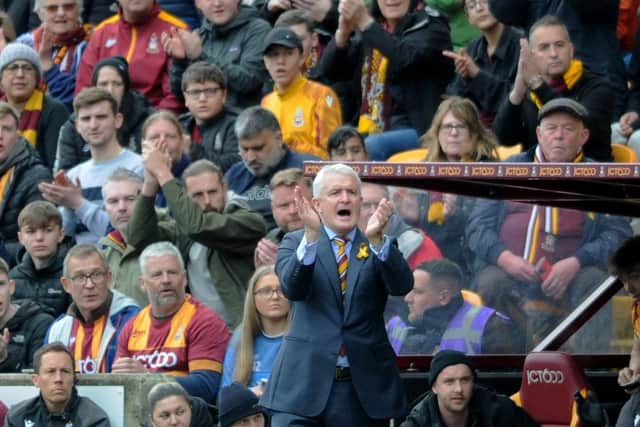 SUPPORT: Bradford City manager Mark Hughes tries to make himself heard above Valley Parade's biggest league crowd for 70 years