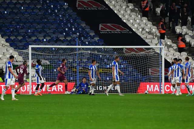 DEFLATED: Huddersfield Town concede a second goal to Cardiff City just 12 minutes into Tuesday's game