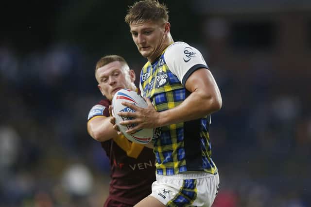 Sam Walters carries the ball in against Huddersfield Giants. (Photo: Ed Sykes/SWpix.com)