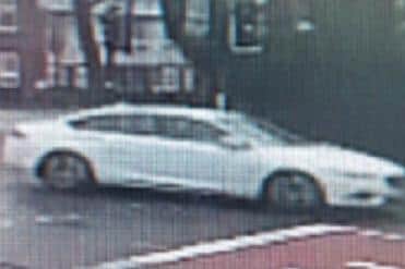 A CCTV image of the white saloon car officers are keen to identify the driver of. (Pic credit: South Yorkshire Police)