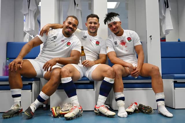 CLOSING IN: Ollie Lawrence, Danny Care and Marcus Smith celebrate defeating Fiji in the World Cup quarter-finals at Stade Velodrome Picture: Dan Mullan/Getty Images