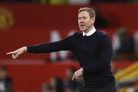 Charlton's English manager Dean Holden gestures on the touchline during the English League Cup quarter final football match between Manchester United and Charlton Athletic, at Old Trafford, in Manchester, north-west England on January 10, 2023. (Photo by OLI SCARFF/AFP via Getty Images)