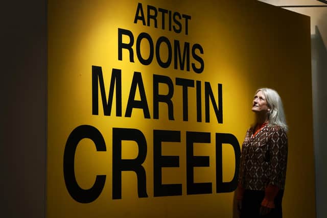 Karen Southworth with work by Turner Prize winning artist Martin Creed, on display at Mercer Art Gallery, Harrogate.
Photographed by Yorkshire Post photographer Jonathan Gawthorpe.