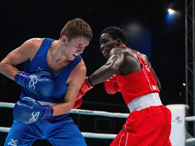 Joe Tyers (blue) of GB fights Assan Hansen (red) of Germany at the World Boxing CUp at the EIS, Sheffield. (Picture: Bruce Rollinson)