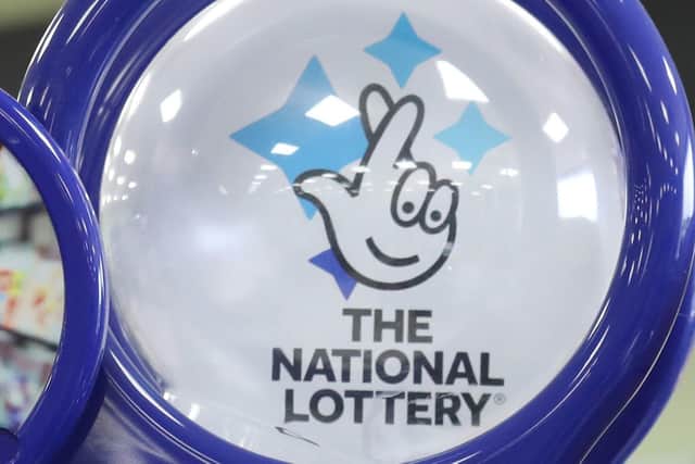 Outgoing National Lottery operator Camelot has revealed its highest half-year sales as soaring numbers of players online offset falling in-store ticket and scratchcard demand amid "difficult" trading on the high street.