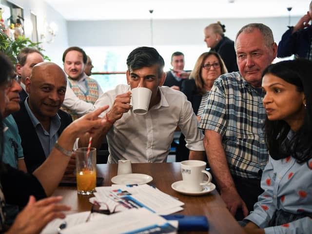Rishi Sunak and his wife Akshata Murty attend a Conservative general election campaign event in Stanmore,