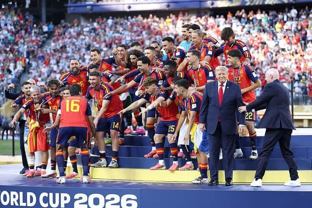 ATTENTION-SEEKER: Gianni Infantino is unable to stop Donald Trump tying to hog the limelight as Spain lift the trophy - but for all the FIFA president's sucking up, he had little influence over the US president (Image: Dan Mullan/Getty Images)
