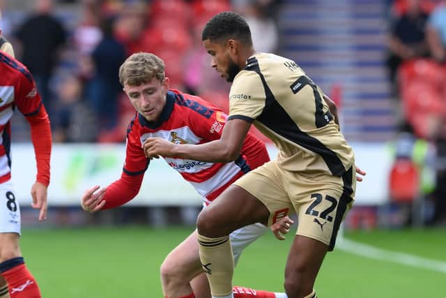 Rotherham United's Denzel Hall, pictured in action in the South Yorkshire derby at Doncaster Rovers earlier this season.