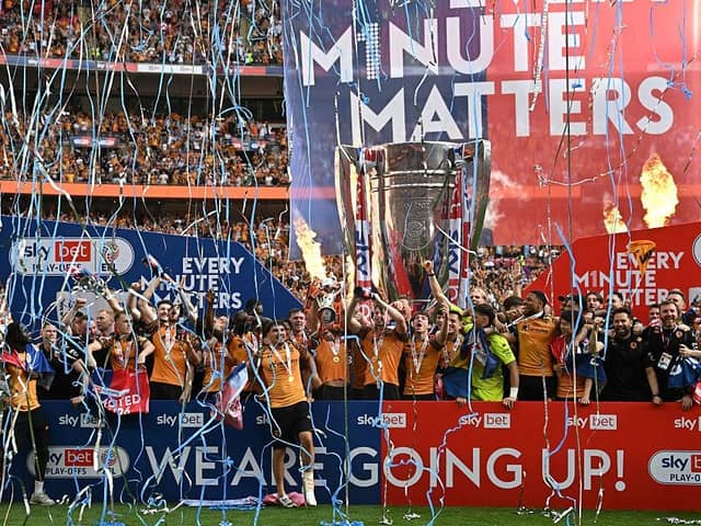 GOING UP: Hull City's players celebrate winning May's Championship play-off final (Image: Paul ELLIS / AFP via Getty Images)