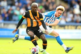 Huddersfield Town's Jack Rudoni (right) and Hull City's Jean Michael Seri during the Sky Bet Championship match at The John Smith's Stadium, Huddersfield. Picture: Nigel French/PA Wire.