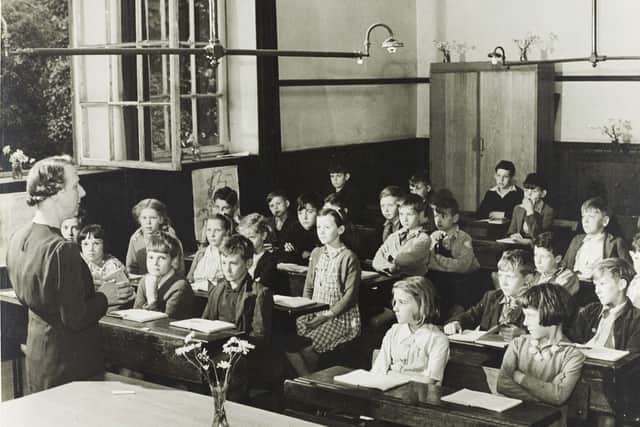 Classroom in National School

Remarkable photographs of Richmond captured by James Allan Cash in August 1945, commissioned by the British Council for an exhibition called The Life of an English Market Town. Over 100 photographs were taken to show all aspects of Richmond life, scenery and streetscapes in the post-war years.