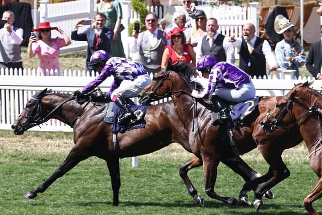 Command performance: Jockey Oisin Murphy rides Shaquille to victory over Ryan Moore on Little Big Bear, right, in the Commonwealth Cup at Royal Ascot - a first Group One for the horse his trainer Julie Camacho.
(Photo by HENRY NICHOLLS / AFP)