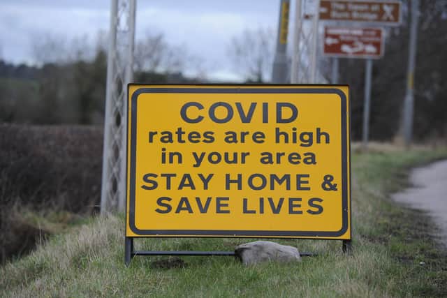 A Covid 19 road sign on Leeds Road in Harrogate in 2021. PIC: Gerard Binks