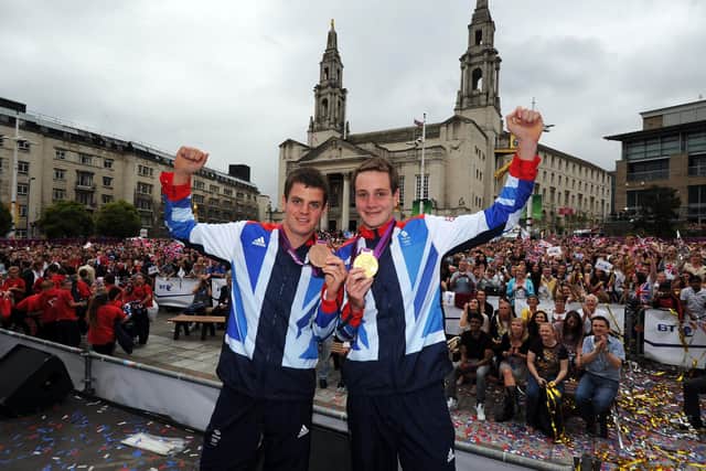 Millennium Square homecoming: Olympic gold winning triathlete Alistair Brownlee and his Bronze winning Jonny Brownlee, celebrate in 2012 (Picture: Simon Hulme)