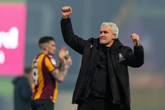 Mark Hughes celebrates at full time after Bradford City's win over Tranmere Rovers. Picture: Bruce Rollinson