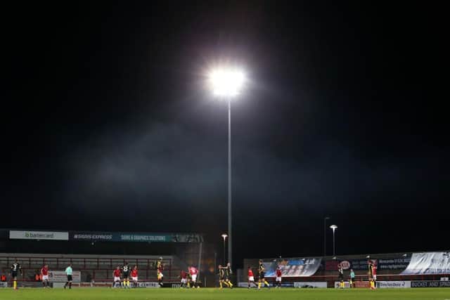 MORECAMBE, ENGLAND - DECEMBER 01: A general view of play is seen during the Sky Bet League Two match between Morecambe and Barrow at Globe Arena on December 01, 2020 in Morecambe, England. Sporting stadiums around the UK remain under strict restrictions due to the Coronavirus Pandemic as Government social distancing laws prohibit fans inside venues resulting in games being played behind closed doors. (Photo by Lewis Storey/Getty Images)