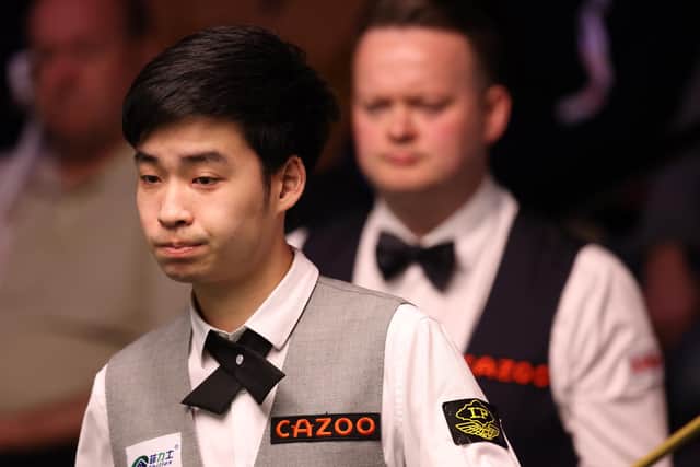 Si Jiahui of China looks on during their round one match against Shaun Murphy of England on Day Six of the Cazoo World Snooker Championship 2023 at Crucible Theatre (Picture: George Wood/Getty Images)