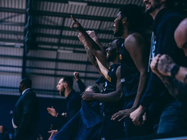 Sheffield Sharks players on the bench celebrate their game three win over Leicester Riders (Picture: Adam Bates)