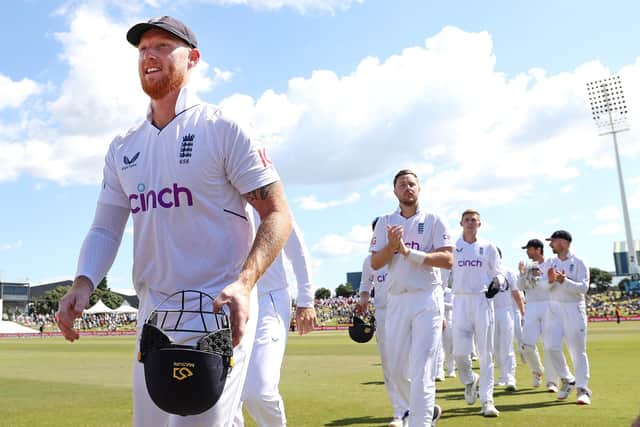 Ben Stokes leads off the England team after their latest triumph, their 10th victory in 11 Test matches since he was appointed captain. Photo by Phil Walter/Getty Images.