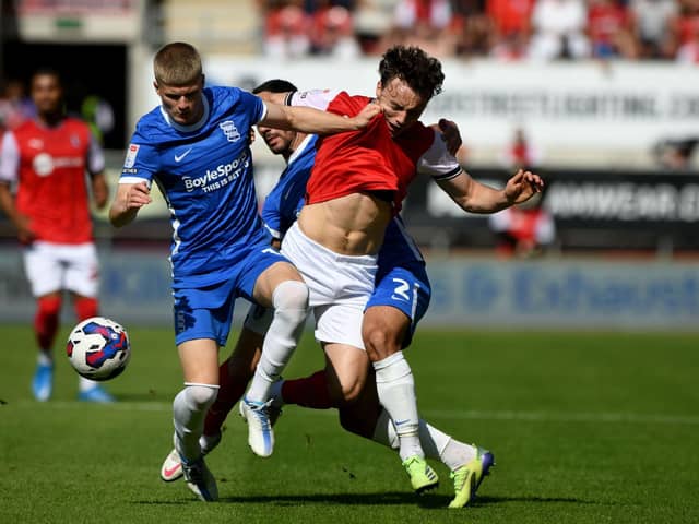 Oliie Rathbone, of Rotherham United, is tackled for the ball by Jordan James, and Maxime Colin, of Birmingham City. Picture: James Hardisty.