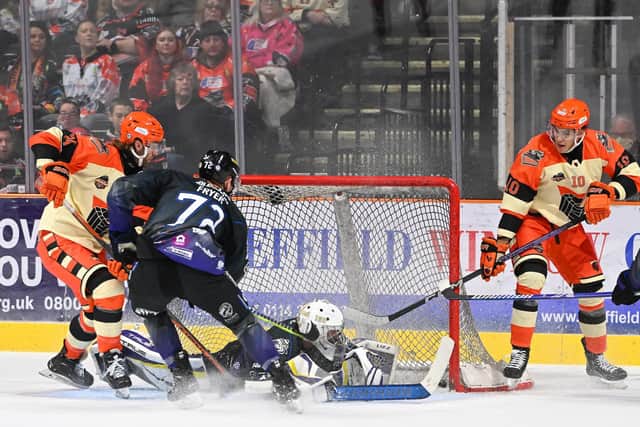 FINAL ACT: Mark Simpson (left) pokes home the Steelers' ninth goal against Manchester. Picture: Dean Woolley/Steelers Media.