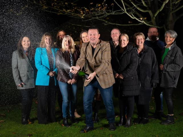 A work syndicate of waiters, office, maintenance and spa staff at Ye Olde Bell Hotel, near Retford in Nottinghamshire, who won £1 million in the EuroMillions UK Millionaire Maker draw. The 13 staff members scooped £76,923 each.
Camelot UK/PA Wire
