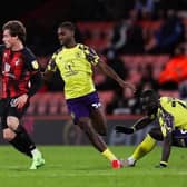 Huddersfield Town's Aaron Rowe (centre) AFC Bournemouth's Rodrigo Riquelme (left) during a Championship clash at the Vitality Stadium in 2021-22. Picture: Kieran Cleeves/PA.