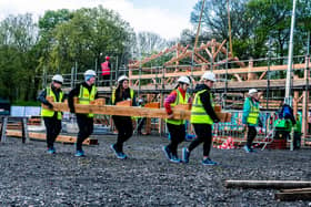 The building of The WOW Barn on Cinder Moor, Woodhouse Lane, Leeds, by over 300 Barn Raisers from across West Yorkshire women, girls and non-binary people including professionals in construction, architecture, engineering, building and STEAM, as well as novices and DIY enthusiasts over a 24-hour period. Picture By Yorkshire Post Photographer,  James Hardisty. Date:1st May 2023.