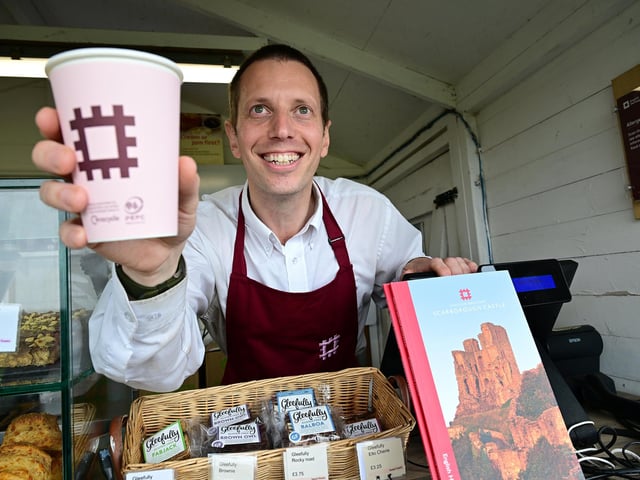 Serving refreshments to excited visitors.