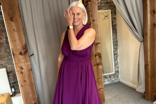 Rachel Peru wears purple Darcy dress, £160, at at blonde-and-wise.co.uk. Lucy says: “I love a Darcy dress for a formal event, but I also love it dressed down with trainers for a city break.”