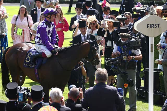 Jockey Oisin Murphy and Shaquille return to the winner's enclosure after victory in the Commonwealth Cup on the fourth day of the Royal Ascot horse racing meeting in Ascot, west of London, on June 23, 2023. (Picture: HENRY NICHOLLS/AFP via Getty Images)
