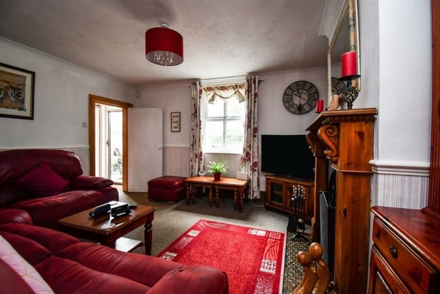 There's plenty of room for all the family in this sitting room