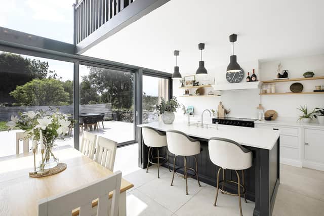 The double height living kitchen with gallery above. The kitchen is by Tom Howley and was a investment item