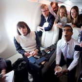 Prime Minister Rishi Sunak holds a huddle with political journalists on board a government plane as he heads to Washington DC.